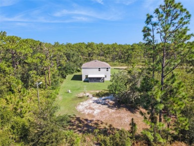 Welcome to your dream home in the peaceful community of Indian on Indian Lake Estates Golf and Country Club in Florida - for sale on GolfHomes.com, golf home, golf lot