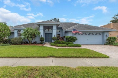 Discover timeless elegance and peaceful living in this stunning on The Links Golf Course in Florida - for sale on GolfHomes.com, golf home, golf lot