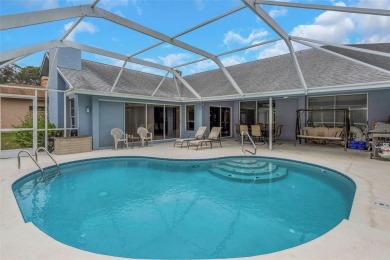 Discover timeless elegance and peaceful living in this stunning on The Links Golf Course in Florida - for sale on GolfHomes.com, golf home, golf lot