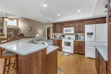 Discover timeless elegance and peaceful living in this stunning on The Links Golf Course in Florida - for sale on GolfHomes.com, golf home, golf lot