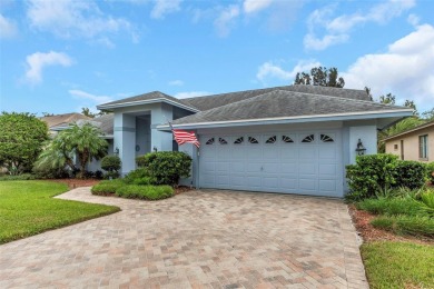 Discover timeless elegance and peaceful living in this stunning on The Links Golf Course in Florida - for sale on GolfHomes.com, golf home, golf lot