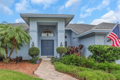 Discover timeless elegance and peaceful living in this stunning on The Links Golf Course in Florida - for sale on GolfHomes.com, golf home, golf lot