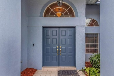 Discover timeless elegance and peaceful living in this stunning on The Links Golf Course in Florida - for sale on GolfHomes.com, golf home, golf lot