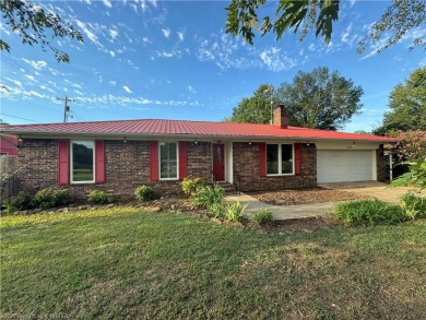 Welcome to this updated 3-bedroom, 3-bathroom home on over 3 on Eagle Crest Golf Course in Arkansas - for sale on GolfHomes.com, golf home, golf lot