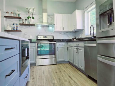 Under contract-accepting backup offers. One or more photo(s) has on Kings Ridge Golf Club in Florida - for sale on GolfHomes.com, golf home, golf lot