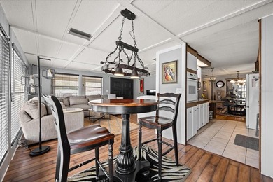 Grab your Towel and Sunscreen and WALK to the Heated Salt Water on Zellwood Station Country Club in Florida - for sale on GolfHomes.com, golf home, golf lot