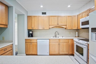 Investors take note! This beautifully furnished 2/2 condo is on Martin County Golf Course in Florida - for sale on GolfHomes.com, golf home, golf lot