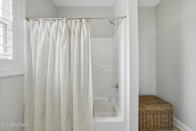 Better than new and truly turnkey, this exceptional ZERO-ENTRY on Toqua Golf Course - Loudon County in Tennessee - for sale on GolfHomes.com, golf home, golf lot