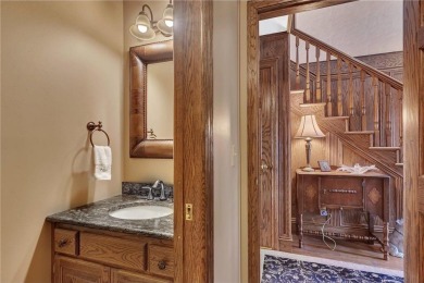 This walkout two-story home sits on a 1/2 acre treed lot and has on St. Cloud Country Club in Minnesota - for sale on GolfHomes.com, golf home, golf lot