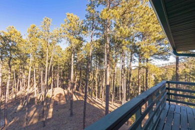 TURNKEY CABIN RETREAT. This three-level cabin sits in the pines on  in South Dakota - for sale on GolfHomes.com, golf home, golf lot