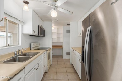 2 bedroom 1.5 bath home on a Cul-de-sac with a fenced  in back on Fountain of the Sun Country Club in Arizona - for sale on GolfHomes.com, golf home, golf lot