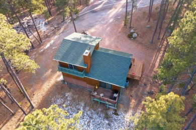 TURNKEY CABIN RETREAT. This three-level cabin sits in the pines on  in South Dakota - for sale on GolfHomes.com, golf home, golf lot