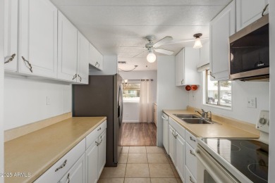 2 bedroom 1.5 bath home on a Cul-de-sac with a fenced  in back on Fountain of the Sun Country Club in Arizona - for sale on GolfHomes.com, golf home, golf lot