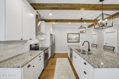 Better than new and truly turnkey, this exceptional ZERO-ENTRY on Toqua Golf Course - Loudon County in Tennessee - for sale on GolfHomes.com, golf home, golf lot