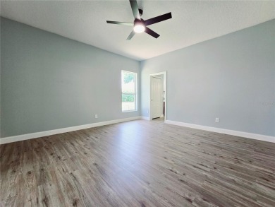 Under contract-accepting backup offers. One or more photo(s) has on Kings Ridge Golf Club in Florida - for sale on GolfHomes.com, golf home, golf lot