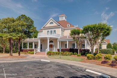 Welcome to 2062 Arnold Palmer Drive-where golf course views meet on Rivers Edge Golf Club in North Carolina - for sale on GolfHomes.com, golf home, golf lot