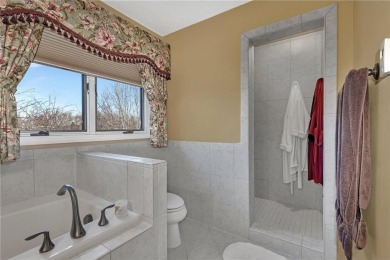 This walkout two-story home sits on a 1/2 acre treed lot and has on St. Cloud Country Club in Minnesota - for sale on GolfHomes.com, golf home, golf lot