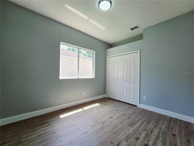 Under contract-accepting backup offers. One or more photo(s) has on Kings Ridge Golf Club in Florida - for sale on GolfHomes.com, golf home, golf lot