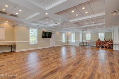 Welcome to 2062 Arnold Palmer Drive-where golf course views meet on Rivers Edge Golf Club in North Carolina - for sale on GolfHomes.com, golf home, golf lot