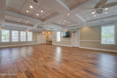 Welcome to 2062 Arnold Palmer Drive-where golf course views meet on Rivers Edge Golf Club in North Carolina - for sale on GolfHomes.com, golf home, golf lot