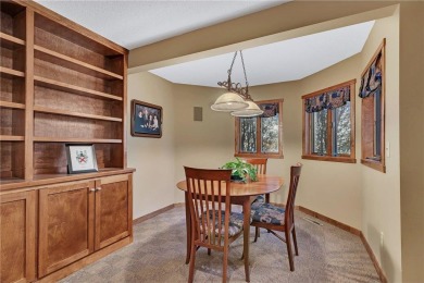 This walkout two-story home sits on a 1/2 acre treed lot and has on St. Cloud Country Club in Minnesota - for sale on GolfHomes.com, golf home, golf lot