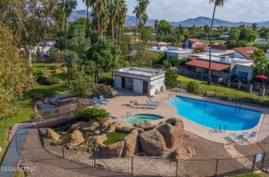 This townhouse golf course property backs up to the fairway and on Dorado Country Club in Arizona - for sale on GolfHomes.com, golf home, golf lot