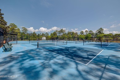 Welcome to 2062 Arnold Palmer Drive-where golf course views meet on Rivers Edge Golf Club in North Carolina - for sale on GolfHomes.com, golf home, golf lot