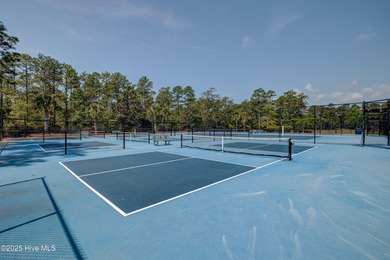 Welcome to 2062 Arnold Palmer Drive-where golf course views meet on Rivers Edge Golf Club in North Carolina - for sale on GolfHomes.com, golf home, golf lot