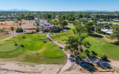 This townhouse golf course property backs up to the fairway and on Dorado Country Club in Arizona - for sale on GolfHomes.com, golf home, golf lot