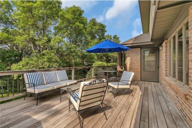 This walkout two-story home sits on a 1/2 acre treed lot and has on St. Cloud Country Club in Minnesota - for sale on GolfHomes.com, golf home, golf lot