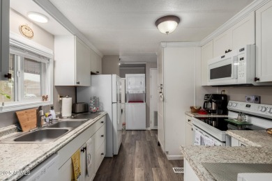 Great   updated  and partially furnished 2 bedroom 2 bath home on Fountain of the Sun Country Club in Arizona - for sale on GolfHomes.com, golf home, golf lot