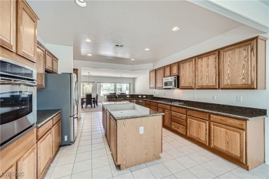 Nestled within the vibrant 55+ Sun City Aliante community, 7465 on Aliante Golf Club in Nevada - for sale on GolfHomes.com, golf home, golf lot