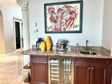 Impeccably Maintained Lakefront Tesoro Estate! This Former Model on The Tesoro Golf Course and Club in Florida - for sale on GolfHomes.com, golf home, golf lot