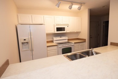 Welcome to this Summerhouse condo at Charlevoix Country Club on Charlevoix Golf and Country Club in Michigan - for sale on GolfHomes.com, golf home, golf lot