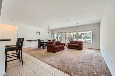 Nestled within the vibrant 55+ Sun City Aliante community, 7465 on Aliante Golf Club in Nevada - for sale on GolfHomes.com, golf home, golf lot