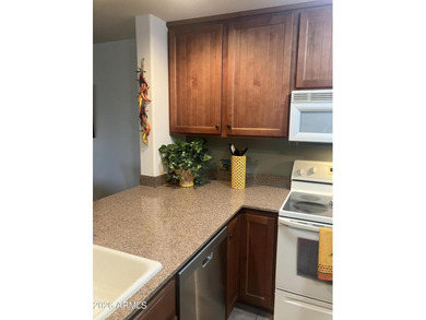 This ground Floor Villa with two master Bedroom Suites is on Desert Forest Golf Club in Arizona - for sale on GolfHomes.com, golf home, golf lot