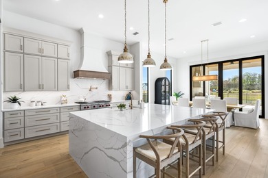 Gracefully situated within the gates of Watersound Camp Creek - on Camp Creek Golf Course in Florida - for sale on GolfHomes.com, golf home, golf lot