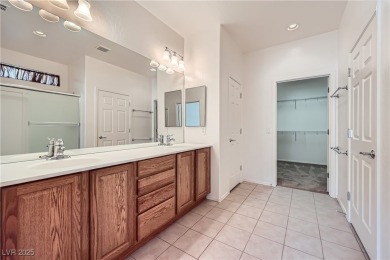 Nestled within the vibrant 55+ Sun City Aliante community, 7465 on Aliante Golf Club in Nevada - for sale on GolfHomes.com, golf home, golf lot