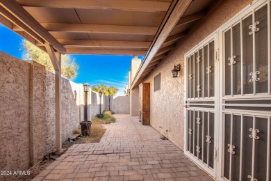 This lovely single level town-home is located in the Bellair on Bellaire Golf Club in Arizona - for sale on GolfHomes.com, golf home, golf lot