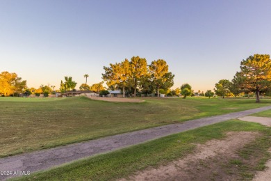 This lovely single level town-home is located in the Bellair on Bellaire Golf Club in Arizona - for sale on GolfHomes.com, golf home, golf lot