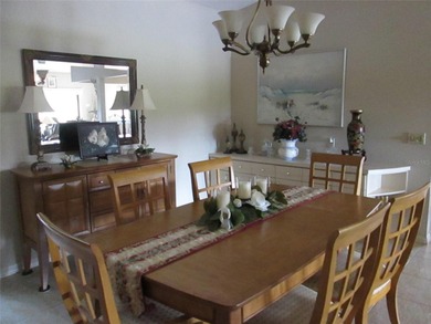 This exquisitely furnished turnkey villa is located  on the on Kingsway Country Club in Florida - for sale on GolfHomes.com, golf home, golf lot