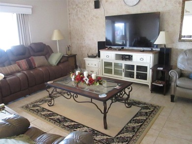 This exquisitely furnished turnkey villa is located  on the on Kingsway Country Club in Florida - for sale on GolfHomes.com, golf home, golf lot