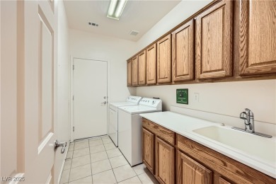 Nestled within the vibrant 55+ Sun City Aliante community, 7465 on Aliante Golf Club in Nevada - for sale on GolfHomes.com, golf home, golf lot