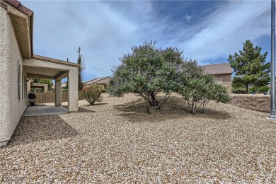 Nestled within the vibrant 55+ Sun City Aliante community, 7465 on Aliante Golf Club in Nevada - for sale on GolfHomes.com, golf home, golf lot