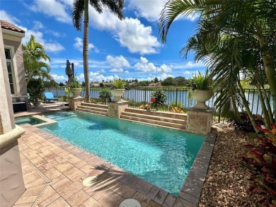 Impeccably Maintained Lakefront Tesoro Estate! This Former Model on The Tesoro Golf Course and Club in Florida - for sale on GolfHomes.com, golf home, golf lot