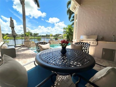 Impeccably Maintained Lakefront Tesoro Estate! This Former Model on The Tesoro Golf Course and Club in Florida - for sale on GolfHomes.com, golf home, golf lot