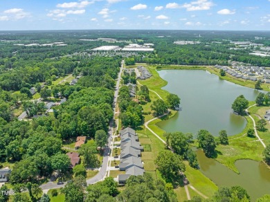 FRONT ROW SEATS TO A LAKE VIEW! Looking for one-level living on Lakeshore Golf Course in North Carolina - for sale on GolfHomes.com, golf home, golf lot
