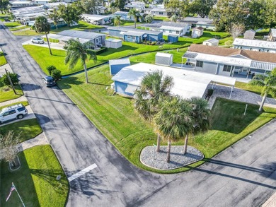 COMPLETELY RENOVATED!! MOVE IN READY!! Kove Estate, a 55+ Co-Op on Cypress Point RV Golf Club in Florida - for sale on GolfHomes.com, golf home, golf lot
