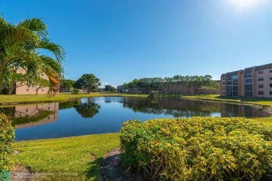 This 4th-floor 55+ penthouse condo offers spectacular views of on Sunrise Lakes Phase III in Florida - for sale on GolfHomes.com, golf home, golf lot