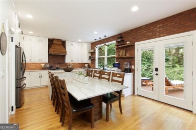 This custom-built home sits on a roundabout cul-de-sac nestled on Hampton Golf Village in Georgia - for sale on GolfHomes.com, golf home, golf lot